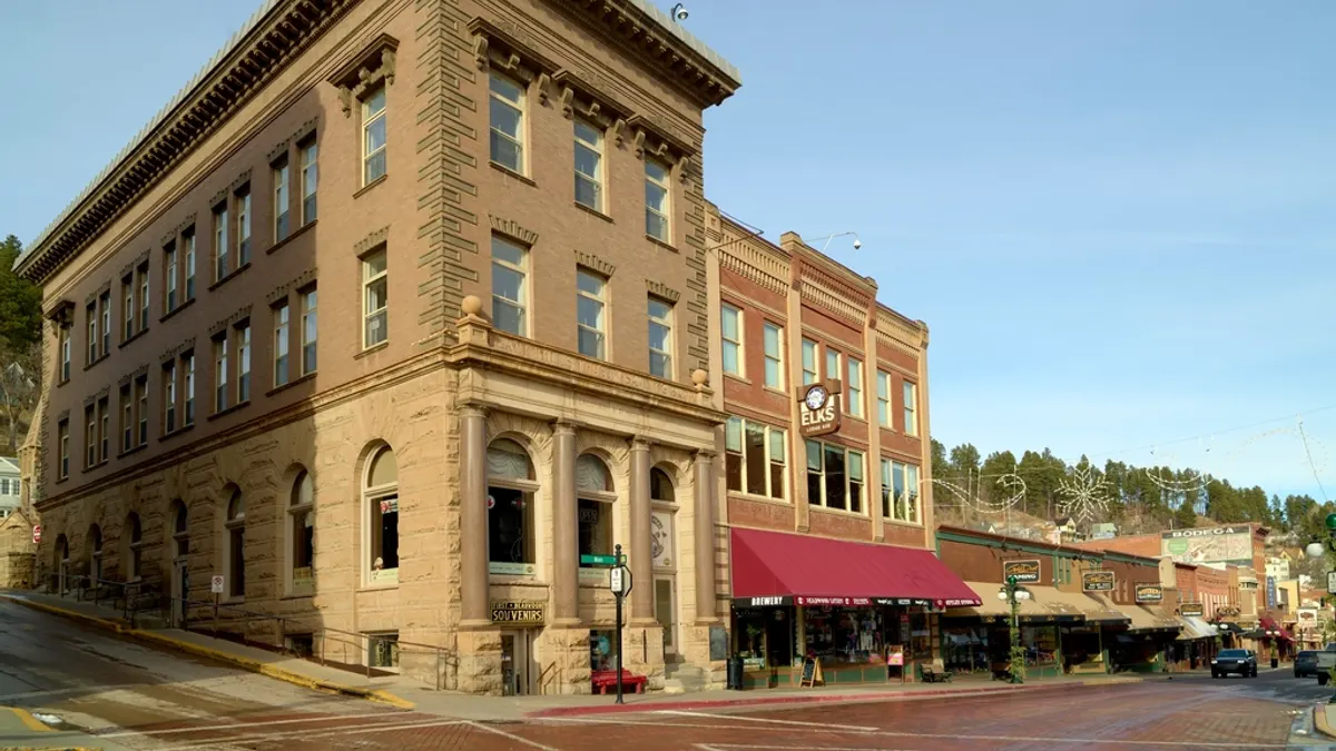 old savings-bank building adjacent, current